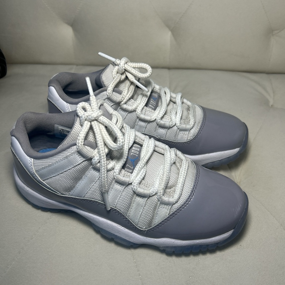 Jordan 11s Gray and White Athletic Sneakers